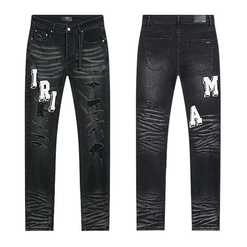 Amiri Varsity Letter Patch Distressed Jeans